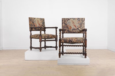 Lot 159 - A pair of Charles II carved beech open armchairs