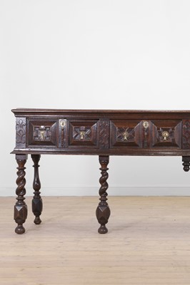 Lot 164 - A Charles II oak low dresser