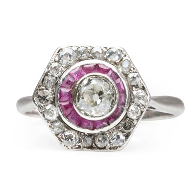Lot 74 - A diamond and ruby hexagonal target ring, c.1940