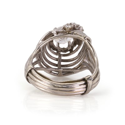 Lot 117 - A white gold diamond wirework swirl design ring