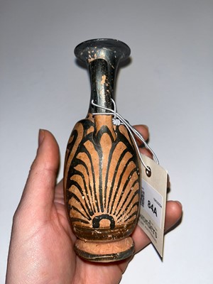 Lot 84 - An Apulian squat red figure pottery lekythos