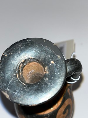 Lot 84 - An Apulian squat red figure pottery lekythos