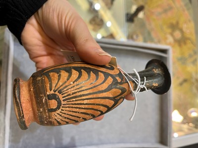 Lot 84 - An Apulian squat red figure pottery lekythos