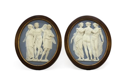 Lot 215 - A pair of Wedgewood blue jasperware oval plaques