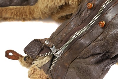 Lot 161 - A WWII Irvin 1943 pattern sheep skin and fleece lined leather flying jacket