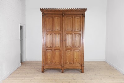 Lot 166 - An oak linenfold wardrobe in the manner of AWN Pugin