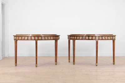 Lot 554 - A pair of neoclassical mahogany and ormolu pier tables