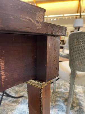 Lot 554 - A pair of neoclassical mahogany and ormolu pier tables