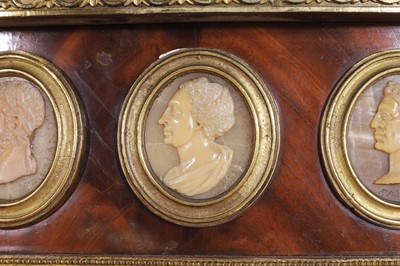Lot 554 - A pair of neoclassical mahogany and ormolu pier tables