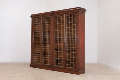 Lot 327 - A fiddle-back mahogany floor-standing bookcase