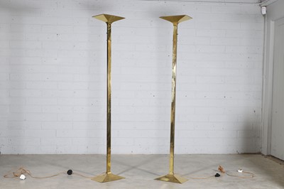Lot 731 - A pair of New Society brass uplighters