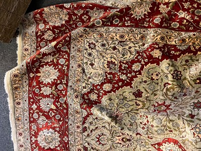 Lot 323 - A Hereke silk rug