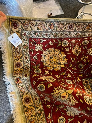 Lot 323 - A Hereke silk rug