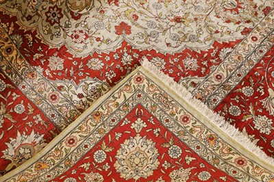 Lot 323 - A Hereke silk rug