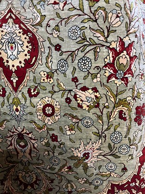 Lot 323 - A Hereke silk rug
