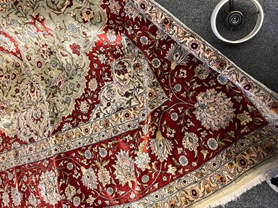 Lot 323 - A Hereke silk rug