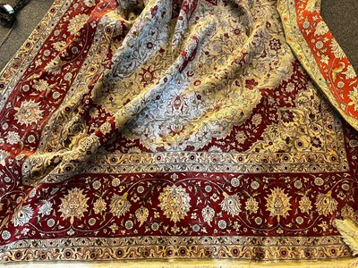 Lot 323 - A Hereke silk rug