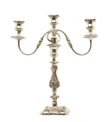 Lot 9 - A silver plated three branch candelabra