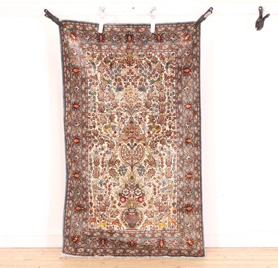 Lot 436 - A silk tree of life design rug