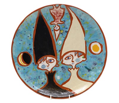 Lot 218 - A glazed pottery charger