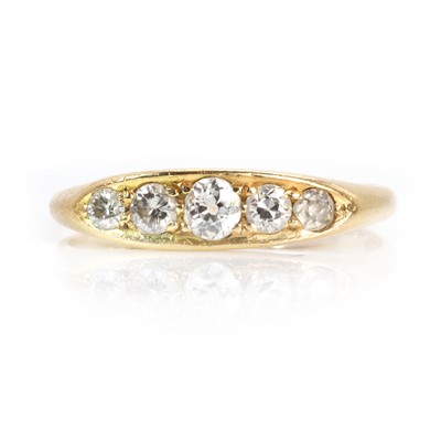 Lot 53 - A gold five stone diamond boat shaped ring