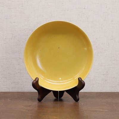 Lot 86 - A Chinese yellow-glazed dish