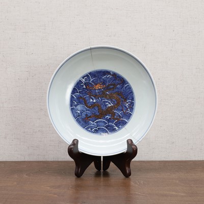Lot 85 - A Chinese underglaze-blue and copper-red dish