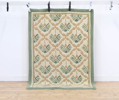 Lot 446 - A 'Lotus' rug