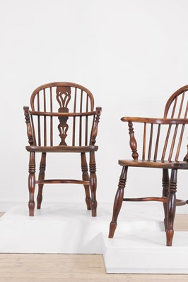 Lot 161 - A matched set of six yew and elm low hoop-back Windsor armchairs