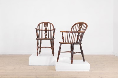Lot 161 - A matched set of six yew and elm low hoop-back Windsor armchairs