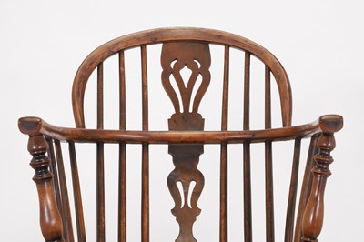 Lot 161 - A matched set of six yew and elm low hoop-back Windsor armchairs