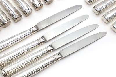 Lot 52 - A collection of twenty-four George III and IV silver knives