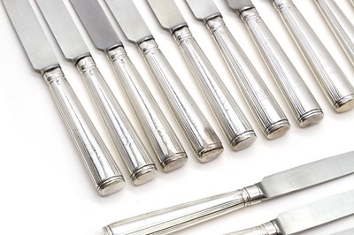 Lot 52 - A collection of twenty-four George III and IV silver knives