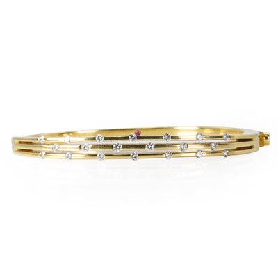 Lot 158 - A diamond three row 'Parisienne' bangle, by Roberto Coin
