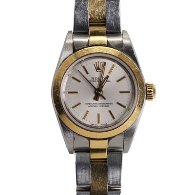 Lot 347 - A ladies' 18ct gold and stainless steel Rolex Oyster Perpetual bracelet watch