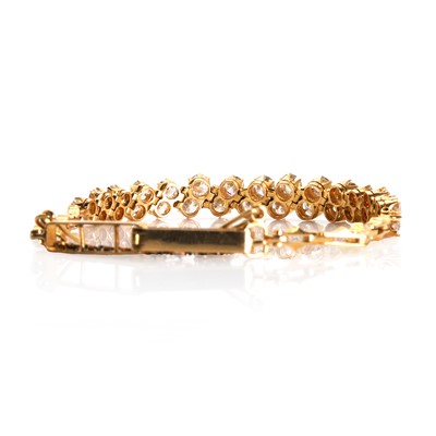 Lot 119 - A double row diamond bracelet