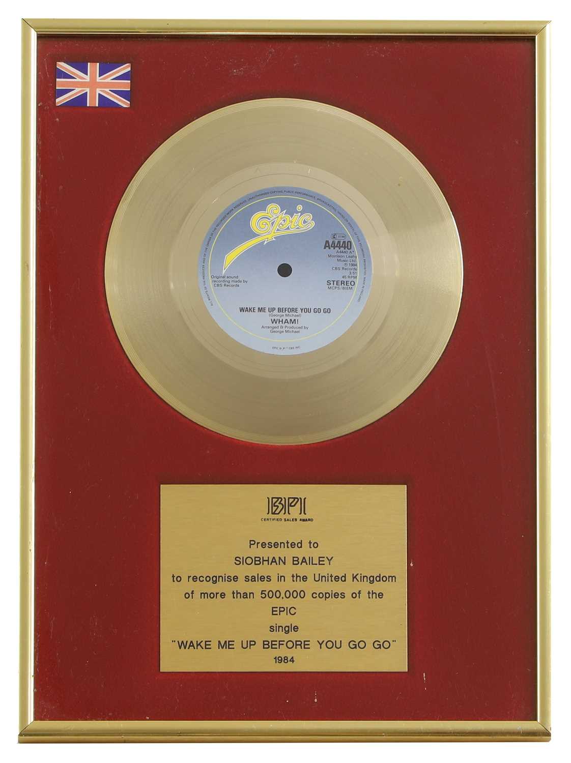 Lot 8 - A gold disc
