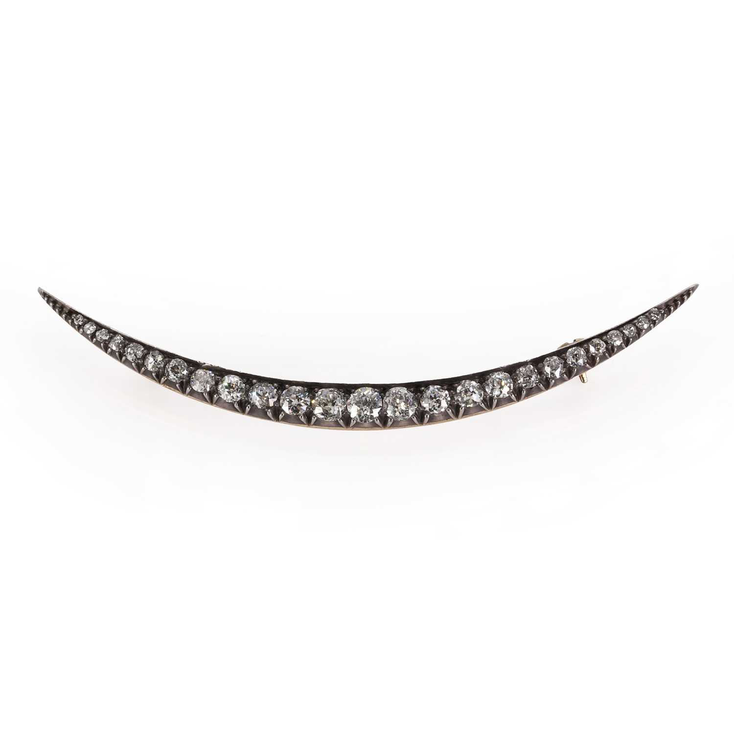 Lot 20 - A Victorian diamond crescent brooch