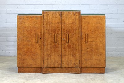 Lot 500 - An Art Deco walnut breakfront sideboard