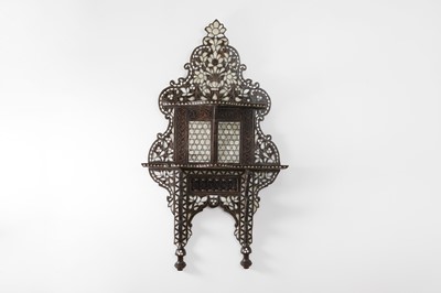 Lot 170 - A stained hardwood and mother-of-pearl inlaid wall bracket