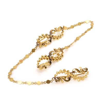 Lot 134 - A high carat gold Kerosang brooch set