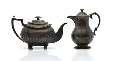 Lot 10 - A George III silver teapot