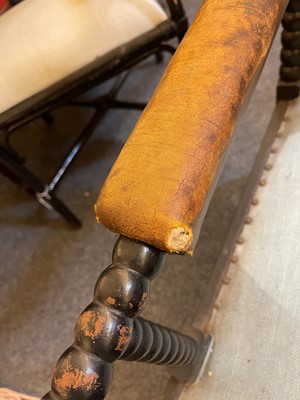 Lot 158 - An ebonised bobbin-framed nursing chair
