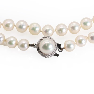 Lot 216 - A single row uniform cultured pearl necklace, with a Mikimoto certificate