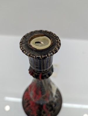 Lot 141 - A pair of Doulton Lambeth stoneware candlesticks