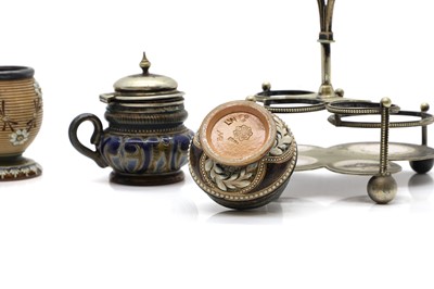 Lot 134 - A Doulton Lambeth stoneware four piece condiment set