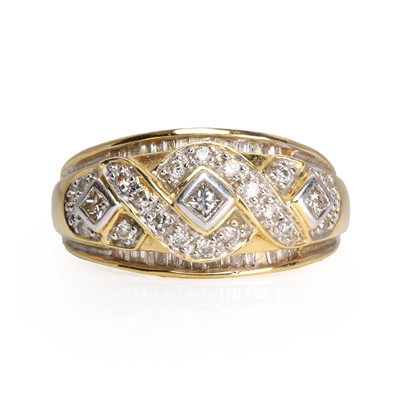 Lot 55 - A 14ct gold diamond bombé ring