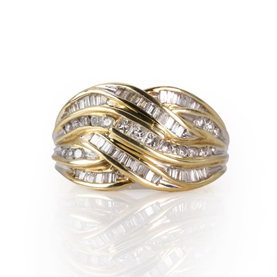 Lot 60 - A 9ct gold diamond crossover ring