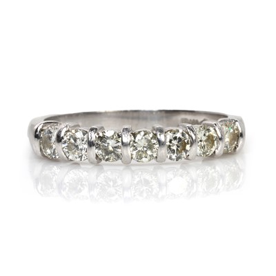 Lot 83 - A platinum and diamond seven stone ring