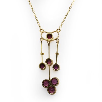 Lot 72 - A rhodolite garnet drop pendant